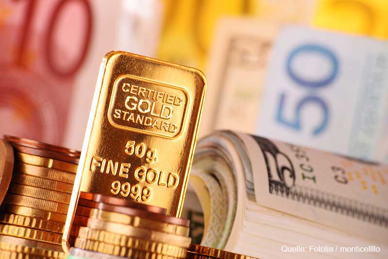 Goldbarren und Geldscheine Goldbarren und Geldscheine